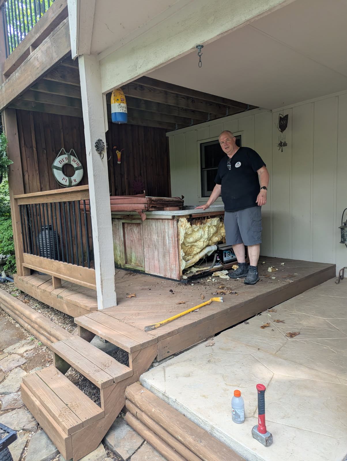 Hot tub before PhD Junk Removal cleared it